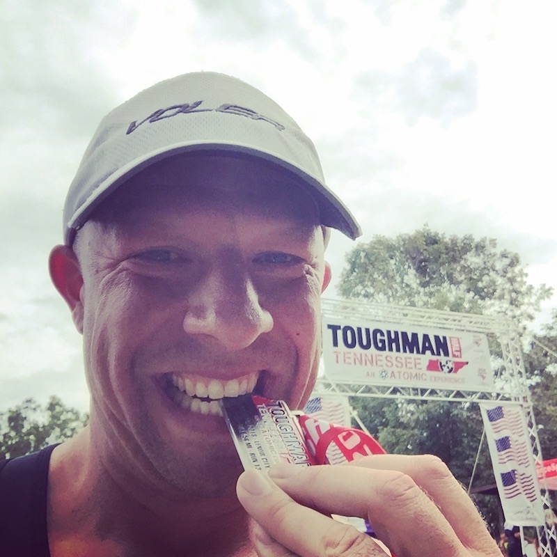 This is him...biting his Toughman medal